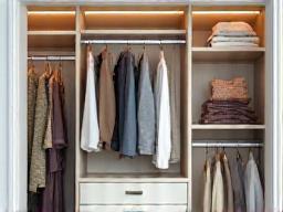 Interior of a neatly organized closet.